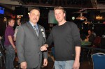 Main Event Champion Scott Stanko with Horseshoe Council Bluffs Poker Room Manager Tom Wiese.