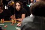 Karina Jett stares down her opponent before deciding on her hand. 