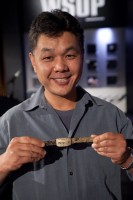 Yan Chen showing off his bracelet. 