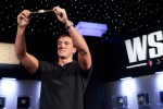 Carter Phillips holds his WSOP Bracelet up high for all to see