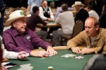 Doyle Brunson and Avery Cardoza chat over a hand in Event 19