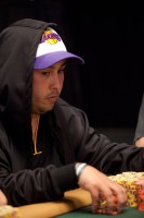 Christopher Gonzales celebrates a Lakers victory and has quite a chip stack of his own