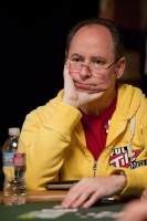 Michael Craig plays a hand in the $2,500 Razz event