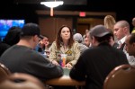 Annie Duke looks serious and in command at her table. 