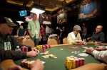 Tournament winner Hoai Pham plays a hand at one of the final tables.