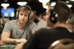 Erik Sagstrom listens to music as he ends the day as the chip leader.