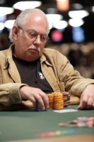 Lyle Berman eyes his chip stack on day 4 of event 2.