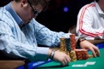 Craig Bergeron checks out his chips while at the final table of event 16. 