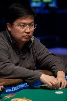 Wenlong Jin plays a hand at the final table of event 47.