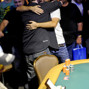 Jason Somerville gets a congratulatory hug by Daniel Negreanu.