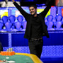 Elie Payan throws his arms up in victory after winning event 22.