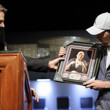 Michael Malm receives his official winner photo from Tournament Director Jack Effel