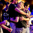 Trevor Pope is mobbed by his friends after winning the WSOP gold bracelet in event 02.