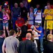 Loni Harwood get a kiss from her boyfriend, Phillip Hui, after winning event 60 at the 2013 World Series of Poker