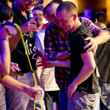 Trevor Pope is mobbed by his friends after winning the WSOP gold bracelet in event 02.