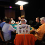 Table 367:  Tom McEvoy, Joe Cada, and chip leader coming into Day 2c Randy Haddox