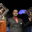 Tournament Director Jack Effel with winner photos to be presented to Michael Malm and Brent Wheeler