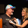 Julie Schneider smiles from ear to ear after husband Tom wins 4th bracelet