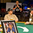 Poker Pro Chad Brown pays tribute to Dr. Jerry Buss. A portrait of Buss on the table in foreground.