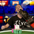 WSOP Gold Bracelet winner Trevor Pope gets a pooch smooch